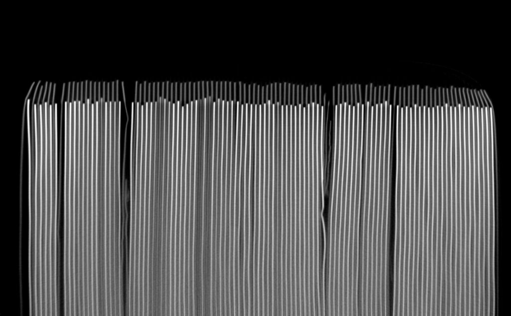 CT image of a battery electrode stack showing tab alignment